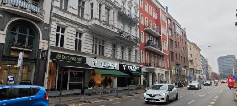 a city street with cars parked on the street at Boutique Hotel Mittendrin Berlin in Berlin 768x346
