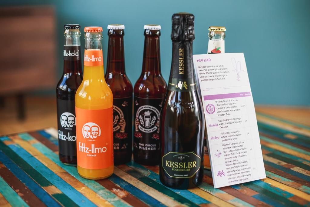 a group of bottles of beer sitting on a table at The Circus Apartments in Berlin