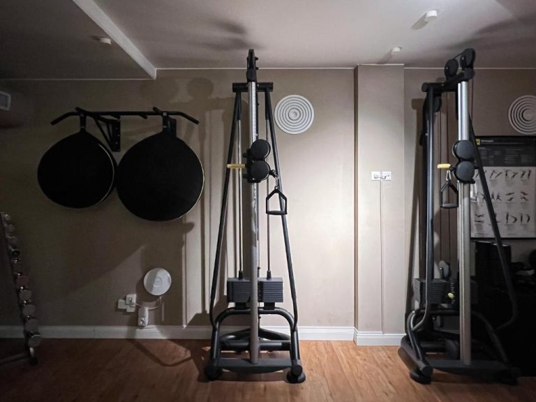 a room with two pans hanging on a wall at ADELANTE Boutique Hotel in Berlin 768x576