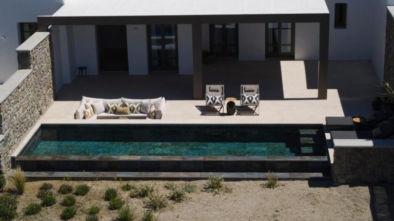 a swimming pool in the middle of a house at Bonzoe Suites Villas in Mikonos 768x431
