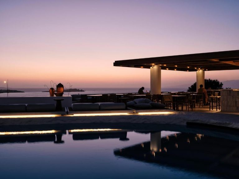 a swimming pool with a table and a pavilion at Boheme Mykonos Town Small Luxury Hotels of the World in Mikonos 768x576
