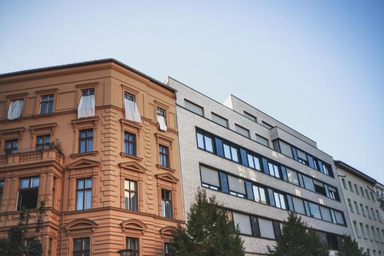 a tall building next to a brick building at The Circus Apartments in Berlin 768x512