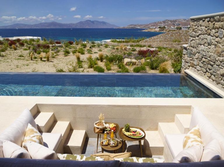 a view of a swimming pool from a house at Bonzoe Suites Villas in Mikonos 768x575
