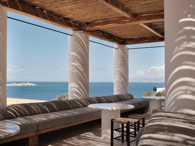 a view of the ocean from the porch of a house at Boheme Mykonos Town Small Luxury Hotels of the World in Mikonos 768x576