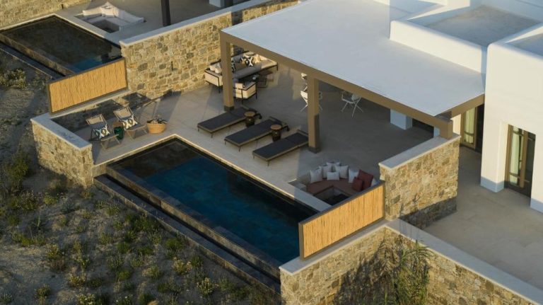 an overhead view of a house with a swimming pool at Bonzoe Suites Villas in Mikonos 768x431